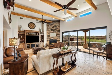 This stunning 5-bedroom, 4-bathroom custom home, built in 2011 on Laughlin Ranch Golf Club in Arizona - for sale on GolfHomes.com, golf home, golf lot