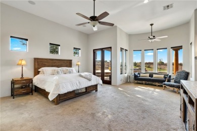 This stunning 5-bedroom, 4-bathroom custom home, built in 2011 on Laughlin Ranch Golf Club in Arizona - for sale on GolfHomes.com, golf home, golf lot