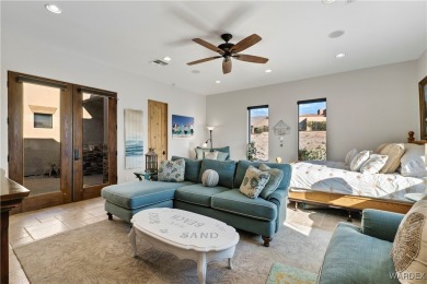 This stunning 5-bedroom, 4-bathroom custom home, built in 2011 on Laughlin Ranch Golf Club in Arizona - for sale on GolfHomes.com, golf home, golf lot