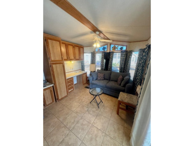 Cute and pristine 1bd/1ba park model located in the amenity rich on Long Island Golf Course in Texas - for sale on GolfHomes.com, golf home, golf lot