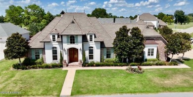 Discover luxury living at its finest in this custom home located on LeTriomphe Golf and Country Club in Louisiana - for sale on GolfHomes.com, golf home, golf lot