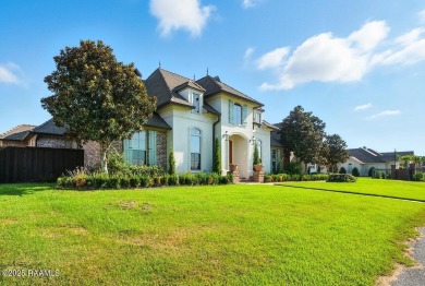 Discover luxury living at its finest in this custom home located on LeTriomphe Golf and Country Club in Louisiana - for sale on GolfHomes.com, golf home, golf lot