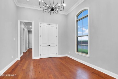 Discover luxury living at its finest in this custom home located on LeTriomphe Golf and Country Club in Louisiana - for sale on GolfHomes.com, golf home, golf lot