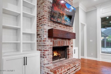 Discover luxury living at its finest in this custom home located on LeTriomphe Golf and Country Club in Louisiana - for sale on GolfHomes.com, golf home, golf lot