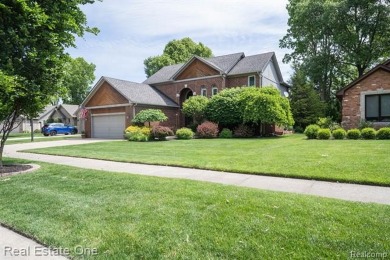 Exceptional 4-bedroom, 3.2-bath. Home in a park-like setting on Fern Hill Country Club in Michigan - for sale on GolfHomes.com, golf home, golf lot
