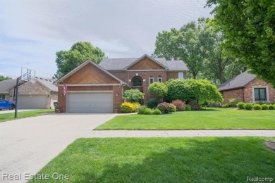 Exceptional 4-bedroom, 3.2-bath. Home in a park-like setting on Fern Hill Country Club in Michigan - for sale on GolfHomes.com, golf home, golf lot