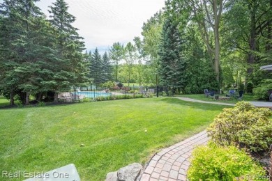 Exceptional 4-bedroom, 3.2-bath. Home in a park-like setting on Fern Hill Country Club in Michigan - for sale on GolfHomes.com, golf home, golf lot