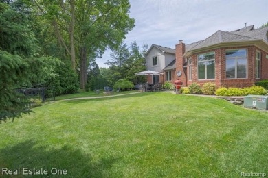 Exceptional 4-bedroom, 3.2-bath. Home in a park-like setting on Fern Hill Country Club in Michigan - for sale on GolfHomes.com, golf home, golf lot