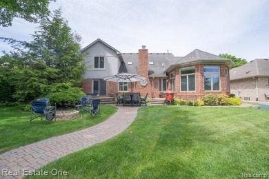 Exceptional 4-bedroom, 3.2-bath. Home in a park-like setting on Fern Hill Country Club in Michigan - for sale on GolfHomes.com, golf home, golf lot