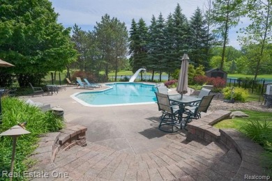 Exceptional 4-bedroom, 3.2-bath. Home in a park-like setting on Fern Hill Country Club in Michigan - for sale on GolfHomes.com, golf home, golf lot