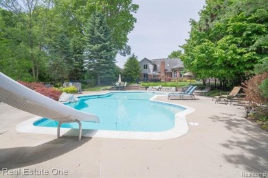 Exceptional 4-bedroom, 3.2-bath. Home in a park-like setting on Fern Hill Country Club in Michigan - for sale on GolfHomes.com, golf home, golf lot