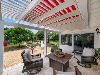 Beautifully renovated 3 bed, 2 bath home with a 2-car garage and on The Little Club in Florida - for sale on GolfHomes.com, golf home, golf lot