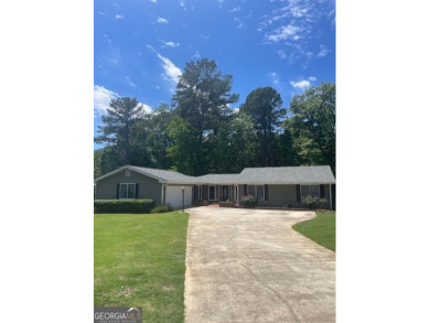 This meticulously cared-for ranch home is happily situated on a on Honey Creek Country Club in Georgia - for sale on GolfHomes.com, golf home, golf lot