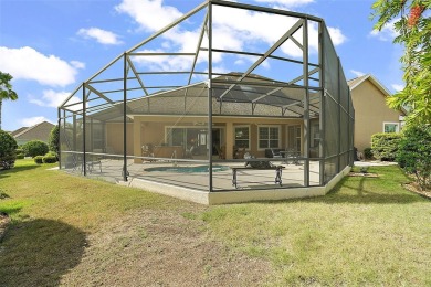 Welcome to this grand 3-bedroom, 2-bathroom PREMIER Sanibel home on The Links of Spruce Creek in Florida - for sale on GolfHomes.com, golf home, golf lot