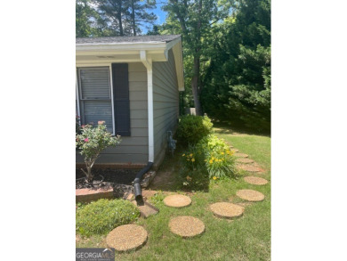 This meticulously cared-for ranch home is happily situated on a on Honey Creek Country Club in Georgia - for sale on GolfHomes.com, golf home, golf lot