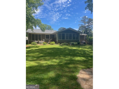 This meticulously cared-for ranch home is happily situated on a on Honey Creek Country Club in Georgia - for sale on GolfHomes.com, golf home, golf lot