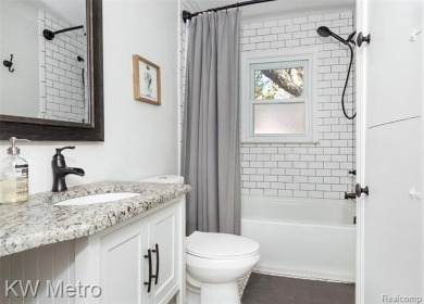 Welcome to this beautifully maintained, three bedroom, brick on Red Run Golf Club in Michigan - for sale on GolfHomes.com, golf home, golf lot