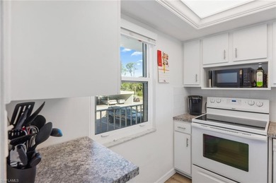 Back on the market! Easy access 2nd-floor 2BR/1BA on Seven Lakes Golf and Tennis Community in Florida - for sale on GolfHomes.com, golf home, golf lot