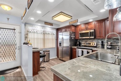 UPDATED & MOVE-IN READY! Turnkey in Portofino at Wynmoor with on Wynmoor Golf Course in Florida - for sale on GolfHomes.com, golf home, golf lot