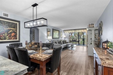 UPDATED & MOVE-IN READY! Turnkey in Portofino at Wynmoor with on Wynmoor Golf Course in Florida - for sale on GolfHomes.com, golf home, golf lot