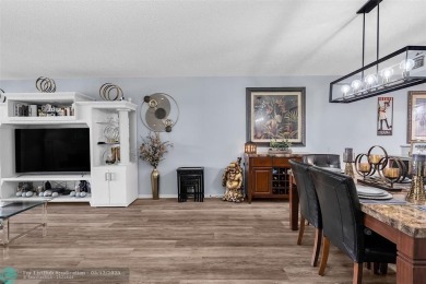 UPDATED & MOVE-IN READY! Turnkey in Portofino at Wynmoor with on Wynmoor Golf Course in Florida - for sale on GolfHomes.com, golf home, golf lot