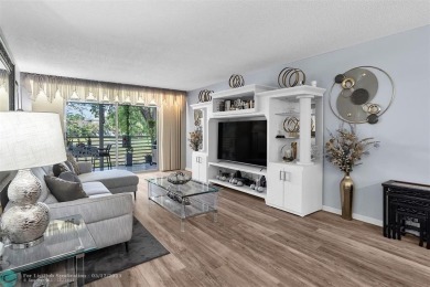 UPDATED & MOVE-IN READY! Turnkey in Portofino at Wynmoor with on Wynmoor Golf Course in Florida - for sale on GolfHomes.com, golf home, golf lot
