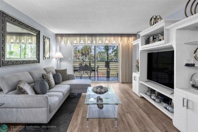 UPDATED & MOVE-IN READY! Turnkey in Portofino at Wynmoor with on Wynmoor Golf Course in Florida - for sale on GolfHomes.com, golf home, golf lot