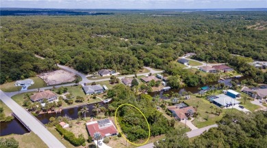 Build your dream home on this stunning waterfront lot in Port on Sabal Trace Golf and Country Club in Florida - for sale on GolfHomes.com, golf home, golf lot