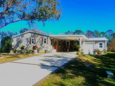 Discover a truly unique home in the desirable Crane Lakes on Crane Lakes Golf and Country Club in Florida - for sale on GolfHomes.com, golf home, golf lot