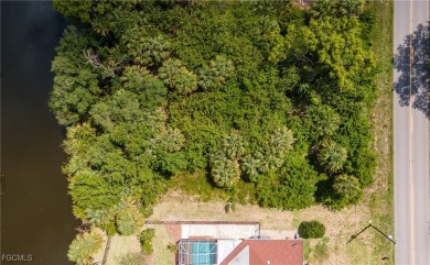 Build your dream home on this stunning waterfront lot in Port on Sabal Trace Golf and Country Club in Florida - for sale on GolfHomes.com, golf home, golf lot