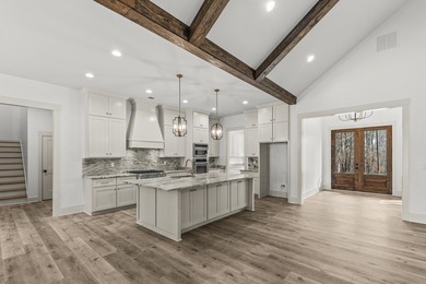 1570 Club Drive is a rare golf-front ranch estate ideally on Harbor Club Golf and Country Club in Georgia - for sale on GolfHomes.com, golf home, golf lot