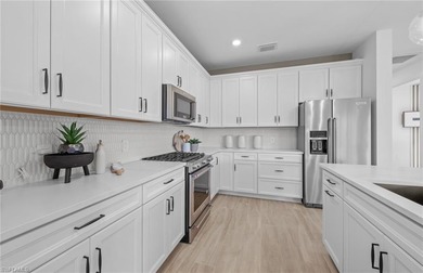 This stunning Mystique Home which is currently under on Valencia Golf and Country Club in Florida - for sale on GolfHomes.com, golf home, golf lot