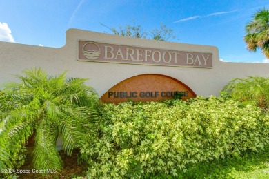 Welcome to this charming 2-bedroom, 2-bathroom manufactured home on Barefoot Bay Golf Course in Florida - for sale on GolfHomes.com, golf home, golf lot