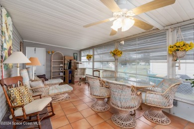 Welcome to this charming 2-bedroom, 2-bathroom manufactured home on Barefoot Bay Golf Course in Florida - for sale on GolfHomes.com, golf home, golf lot