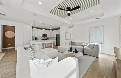 This stunning Mystique Home which is currently under on Valencia Golf and Country Club in Florida - for sale on GolfHomes.com, golf home, golf lot