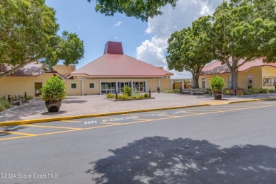 Welcome to this charming 2-bedroom, 2-bathroom manufactured home on Barefoot Bay Golf Course in Florida - for sale on GolfHomes.com, golf home, golf lot