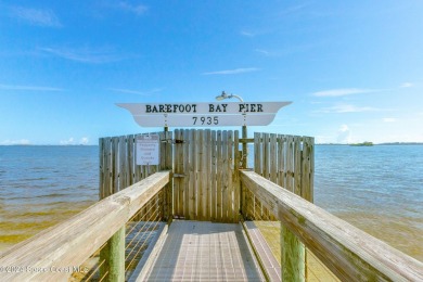 Welcome to this charming 2-bedroom, 2-bathroom manufactured home on Barefoot Bay Golf Course in Florida - for sale on GolfHomes.com, golf home, golf lot