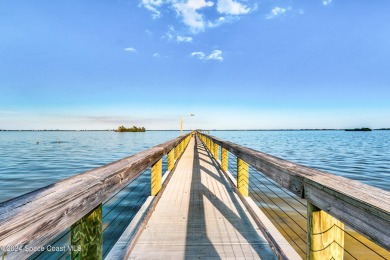 Welcome to this charming 2-bedroom, 2-bathroom manufactured home on Barefoot Bay Golf Course in Florida - for sale on GolfHomes.com, golf home, golf lot