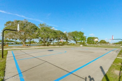 Welcome to this charming 2-bedroom, 2-bathroom manufactured home on Barefoot Bay Golf Course in Florida - for sale on GolfHomes.com, golf home, golf lot