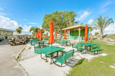 Welcome to this charming 2-bedroom, 2-bathroom manufactured home on Barefoot Bay Golf Course in Florida - for sale on GolfHomes.com, golf home, golf lot