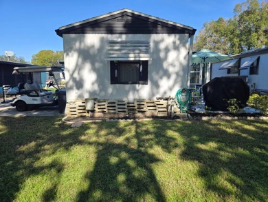 This immaculate, well maintained 2/2 manufactured home is a must on Lake Henry Golf Club in Florida - for sale on GolfHomes.com, golf home, golf lot