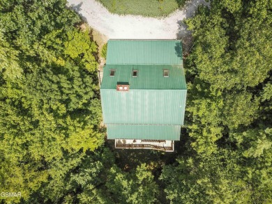 Make this adorable cabin your getaway to the Great Smoky on Laurel Valley Golf Course in Tennessee - for sale on GolfHomes.com, golf home, golf lot