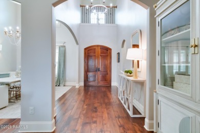 Nestled in the prestigious gated community of Le Triomphe Golf & on LeTriomphe Golf and Country Club in Louisiana - for sale on GolfHomes.com, golf home, golf lot