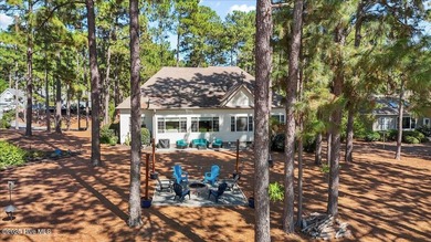 Nestled on the golf course in the gated community of Seven Lakes on Beacon Ridge Golf and Country Club in North Carolina - for sale on GolfHomes.com, golf home, golf lot