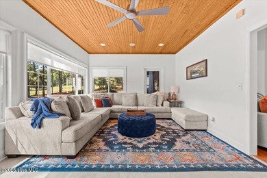 Nestled on the golf course in the gated community of Seven Lakes on Beacon Ridge Golf and Country Club in North Carolina - for sale on GolfHomes.com, golf home, golf lot