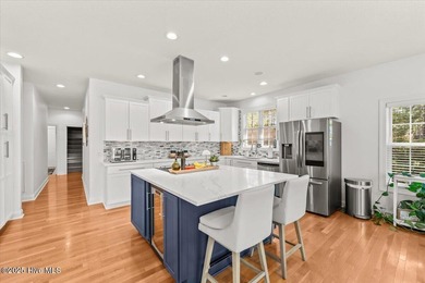 Nestled on the golf course in the gated community of Seven Lakes on Beacon Ridge Golf and Country Club in North Carolina - for sale on GolfHomes.com, golf home, golf lot