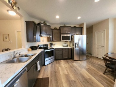 Hang up the work and enjoy the play in this 55+ Del Webb on Oaktree Golf Course in Indiana - for sale on GolfHomes.com, golf home, golf lot