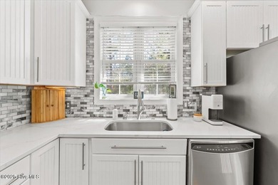 Nestled on the golf course in the gated community of Seven Lakes on Beacon Ridge Golf and Country Club in North Carolina - for sale on GolfHomes.com, golf home, golf lot