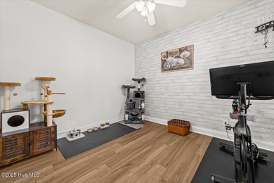 Nestled on the golf course in the gated community of Seven Lakes on Beacon Ridge Golf and Country Club in North Carolina - for sale on GolfHomes.com, golf home, golf lot