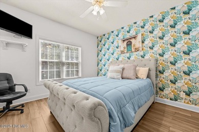 Nestled on the golf course in the gated community of Seven Lakes on Beacon Ridge Golf and Country Club in North Carolina - for sale on GolfHomes.com, golf home, golf lot